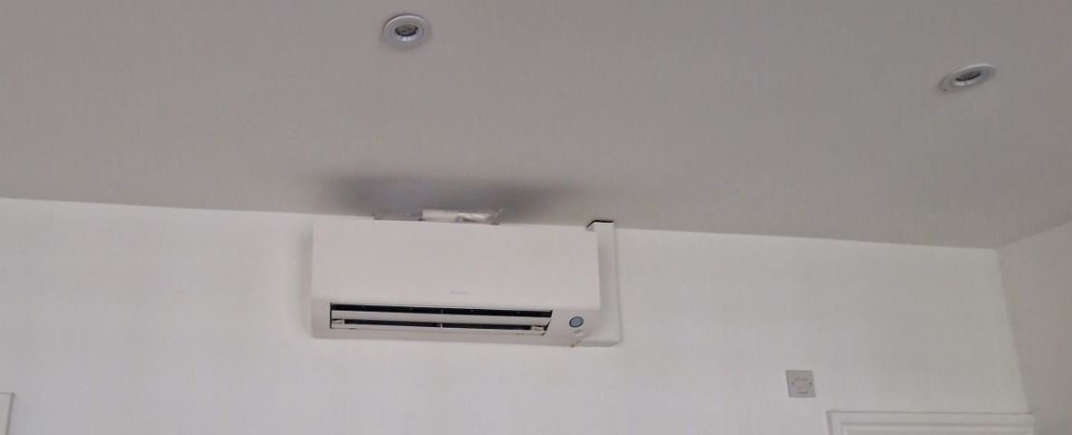 Daikin air conditioning unit on installation day with walls prepared for making good